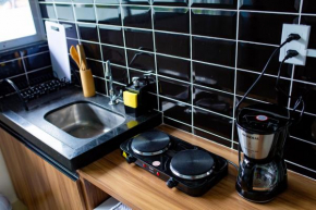 Loft c varanda e pisc bem localizado a 7min do mar